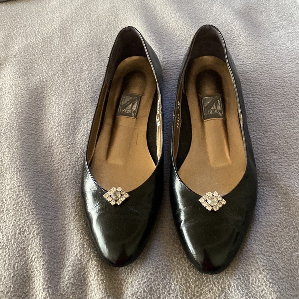 J. RENEE Black flats. Size 7.  Comes with clip on shoe jewelry